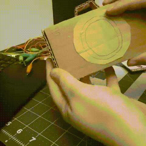 This is the inside look at the camera. It splits open for the makey makey to be placed inside and wired up. In theory the box would be big enough to support both the bread board and the makey makey. 