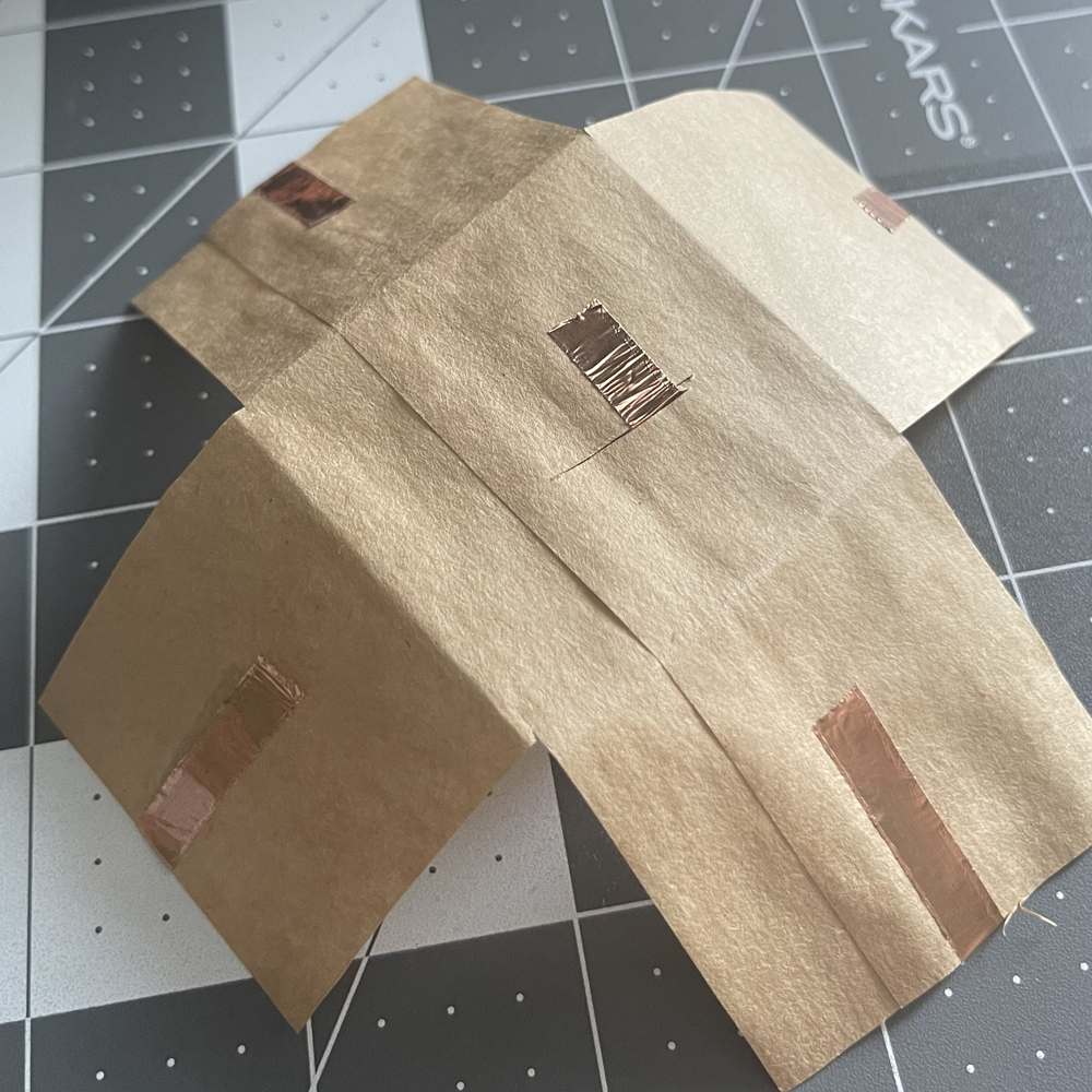 This is the back of the paper prototype. I put a little slit in the middle for the copper tape to fit in.