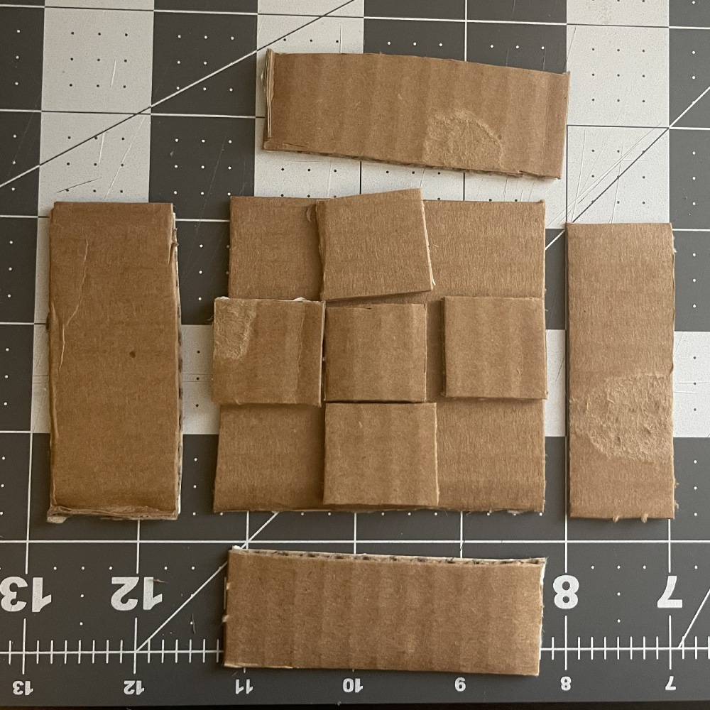 I made a cardboard prototype with a static dancefloor. These were the pieces I cut out.