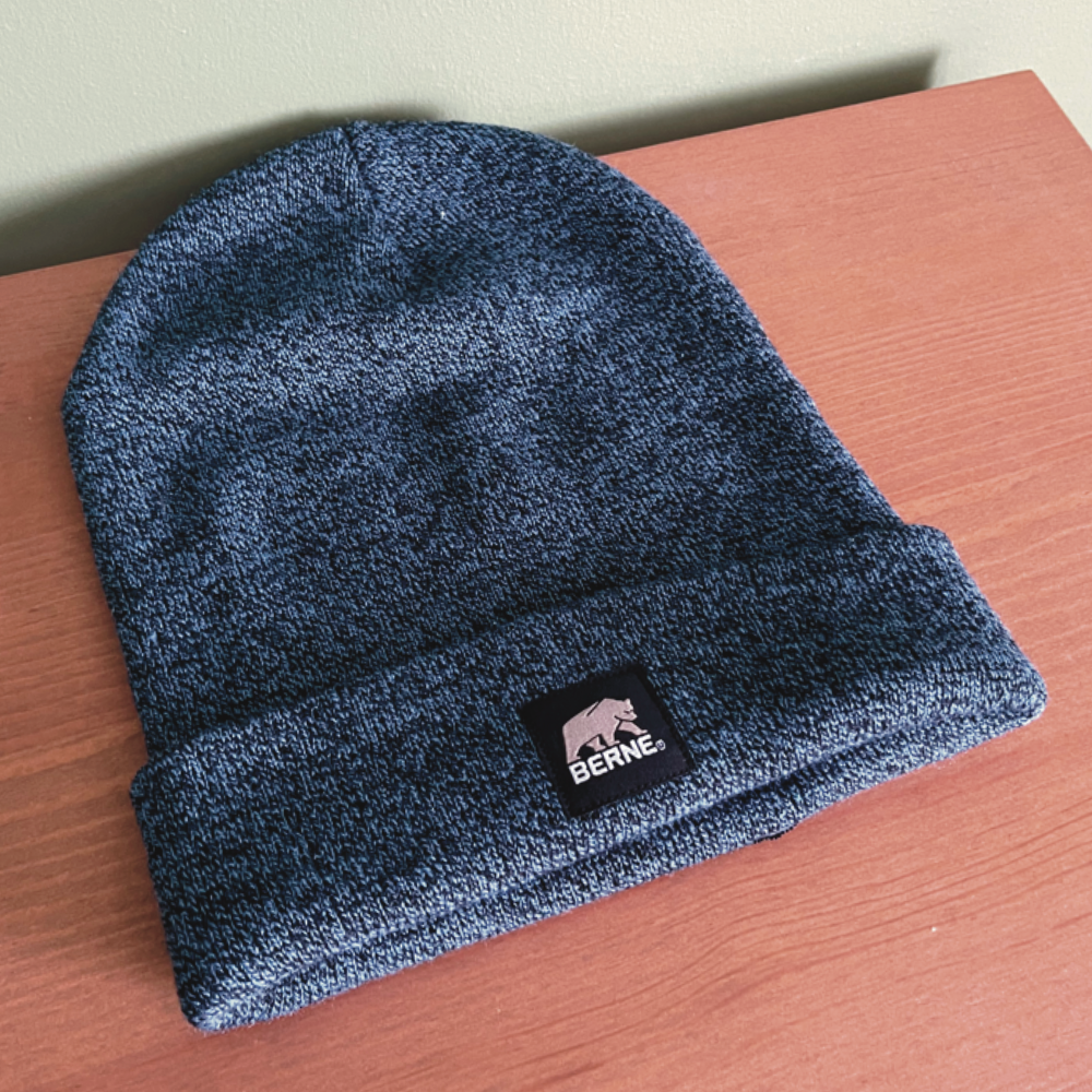 Here is the Berne hat that I own. The material is very soft and adding onto it would be easy to do.